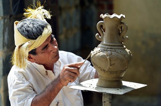 Thủ tướng đồng ý trình UNESCO hồ sơ Nghệ thuật Xòe Thái và Nghệ thuật làm gốm của người Chăm - Ảnh 2.