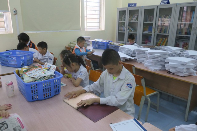 Vụ Thư viện trao tặng sách, đĩa cho học sinh trường PTCS Nguyễn Đình Chiểu - Ảnh 6.