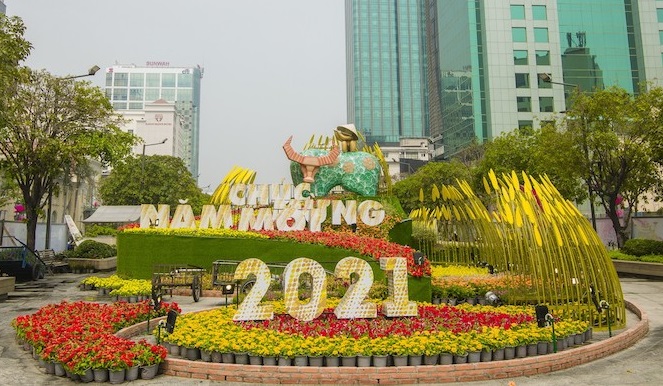 TP Hồ Chí Minh tổ chức Đường hoa Tết năm 2022 với chủ đề 'Xuân quê hương - Ấm tình nhân ái' - Ảnh 1.