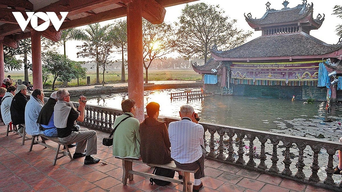 Nghệ thuật rối nước dân gian: Đổi mới để bắt nhịp đời sống văn hóa đương đại - Ảnh 1. Nghệ thuật rối nước dân gian: Đổi mới để bắt nhịp đời sống văn hóa đương đại - Ảnh 1.