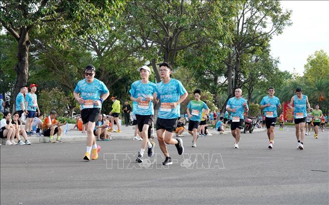 12.000 vận động viên tranh tài tại giải chạy VnExpress Marathon Quy Nhơn 2025 - Ảnh 1. 12.000 vận động viên tranh tài tại giải chạy VnExpress Marathon Quy Nhơn 2025 - Ảnh 1.