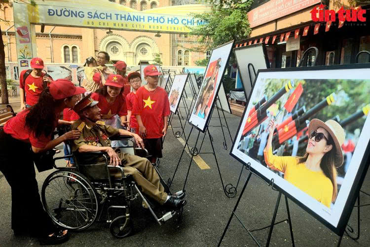 TP Hồ Chí Minh: Triển lãm và ra mắt sách ảnh '50 năm niềm vui thống nhất' - Ảnh 5.