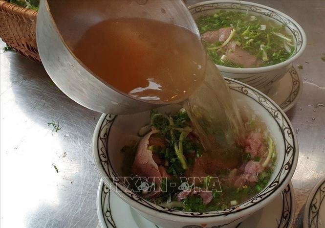 Hành trình chinh phục vị giác của du khách trải nghiệm ẩm thực Hà Nội - Ảnh 2. Hành trình chinh phục vị giác của du khách trải nghiệm ẩm thực Hà Nội - Ảnh 2.