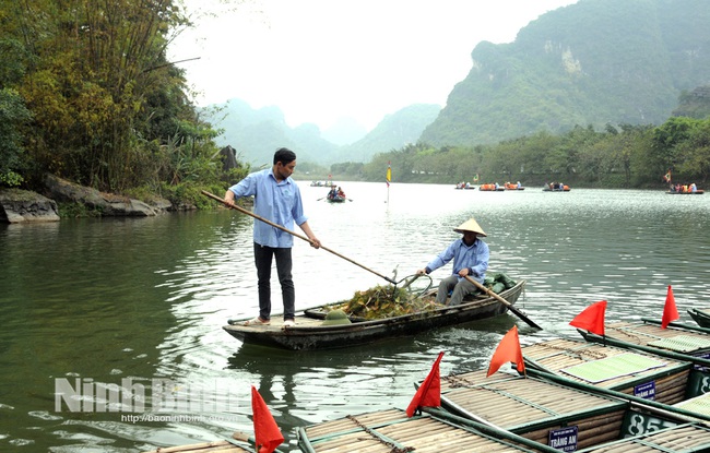 Bảo vệ môi trường gắn với phát triển du lịch tại Quần thể danh thắng Tràng An - Ảnh 1.