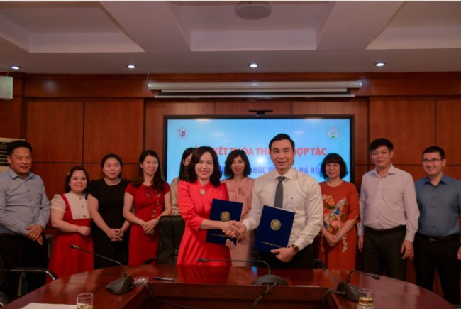 Lễ ký kết biên bản hợp tác giữa Trường Đại học Văn hóa Hà Nội và Trường THPT Lam Hồng - Ảnh 1.