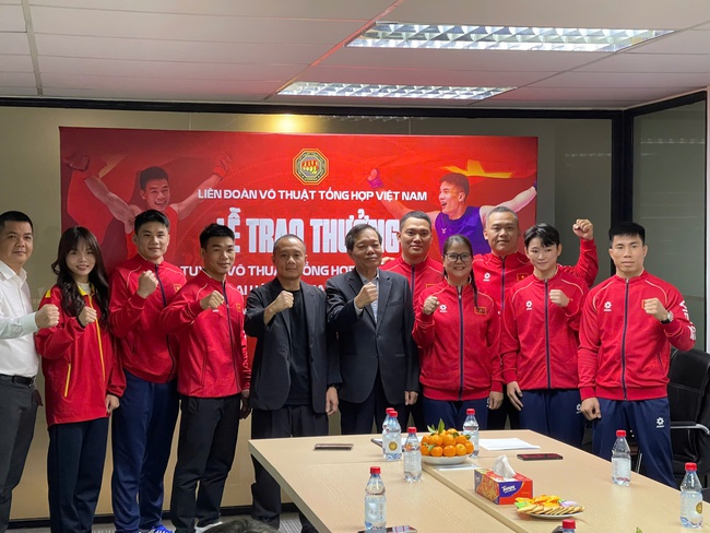 Liên đoàn Võ thuật tổng hợp Việt Nam vinh danh đội tuyển MMA đạt thành tích xuất sắc tại SEA Games 33 - Ảnh 2.