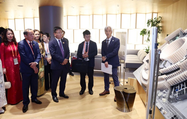 Nhà Triển lãm Việt Nam tại EXPO 2025 là nơi hội tụ tinh hoa văn hóa, trí tuệ và khát vọng vươn lên của dân tộc Việt Nam - Ảnh 5. Nhà Triển lãm Việt Nam tại EXPO 2025 là nơi hội tụ tinh hoa văn hóa, trí tuệ và khát vọng vươn lên của dân tộc Việt Nam - Ảnh 5.