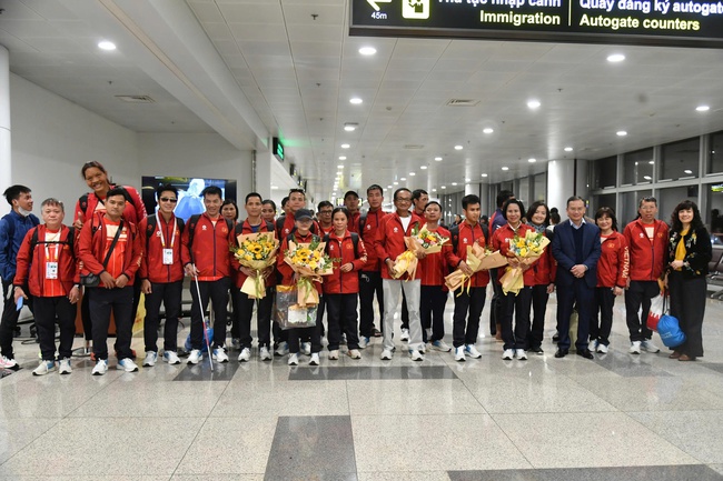 Đoàn Thể thao Người khuyết tật Việt Nam trở về nước sau kỳ ASEAN Para Games 13 đầy ấn tượng - Ảnh 2. Đoàn Thể thao Người khuyết tật Việt Nam trở về nước sau kỳ ASEAN Para Games 13 đầy ấn tượng - Ảnh 2.